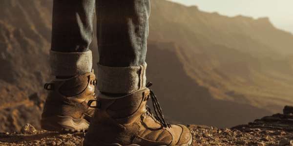 boots at the edge of a cliff