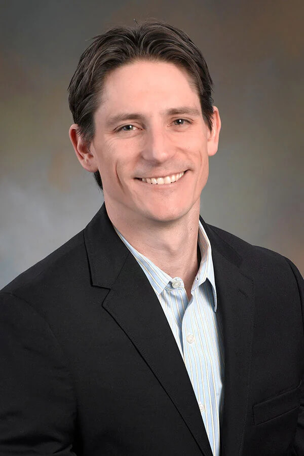 headshot of laczynski