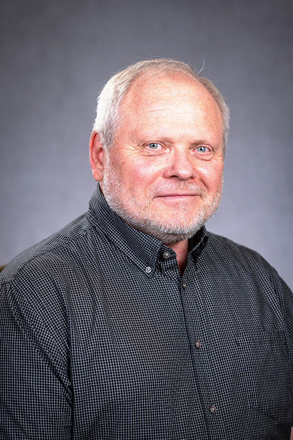headshot of miller