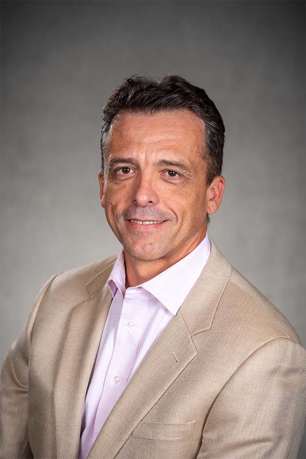 headshot of sinnreich