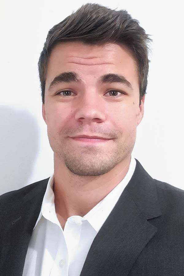 headshot of nelson
