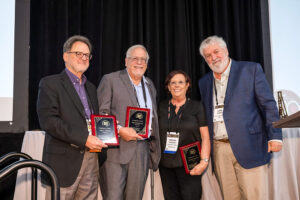 Presidents Award recipients John Anderson, Peter Kandaris and Lorraine Engleman with DFI President James Johnson.