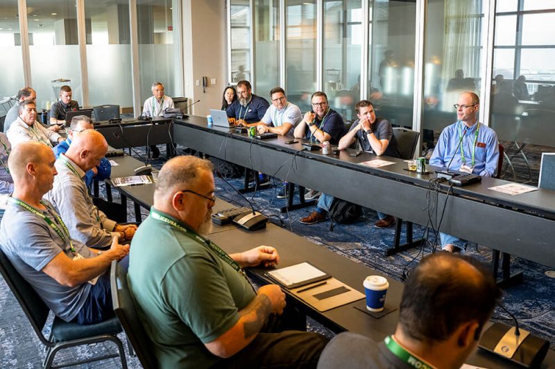 people sitting around a conference table